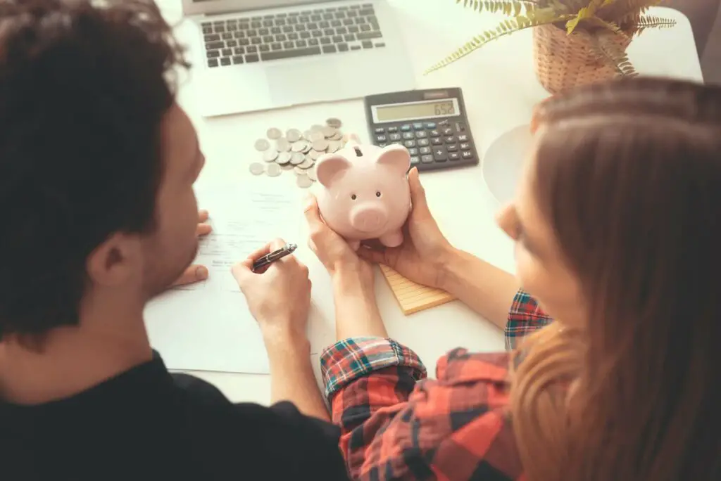 A young couple saving money for their mortgage