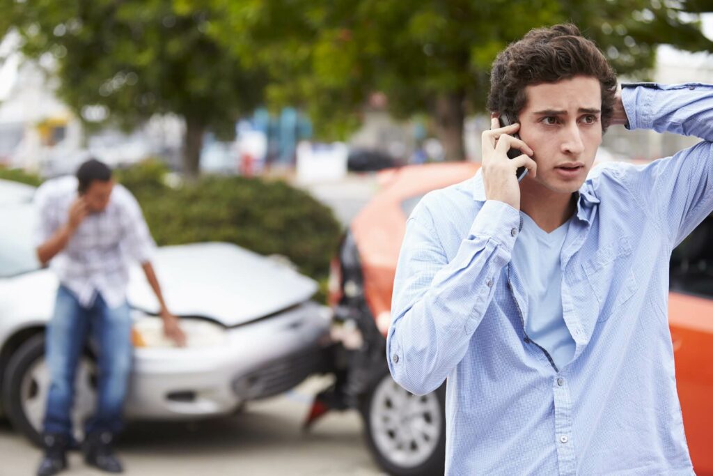Worried man talking on a cellphone