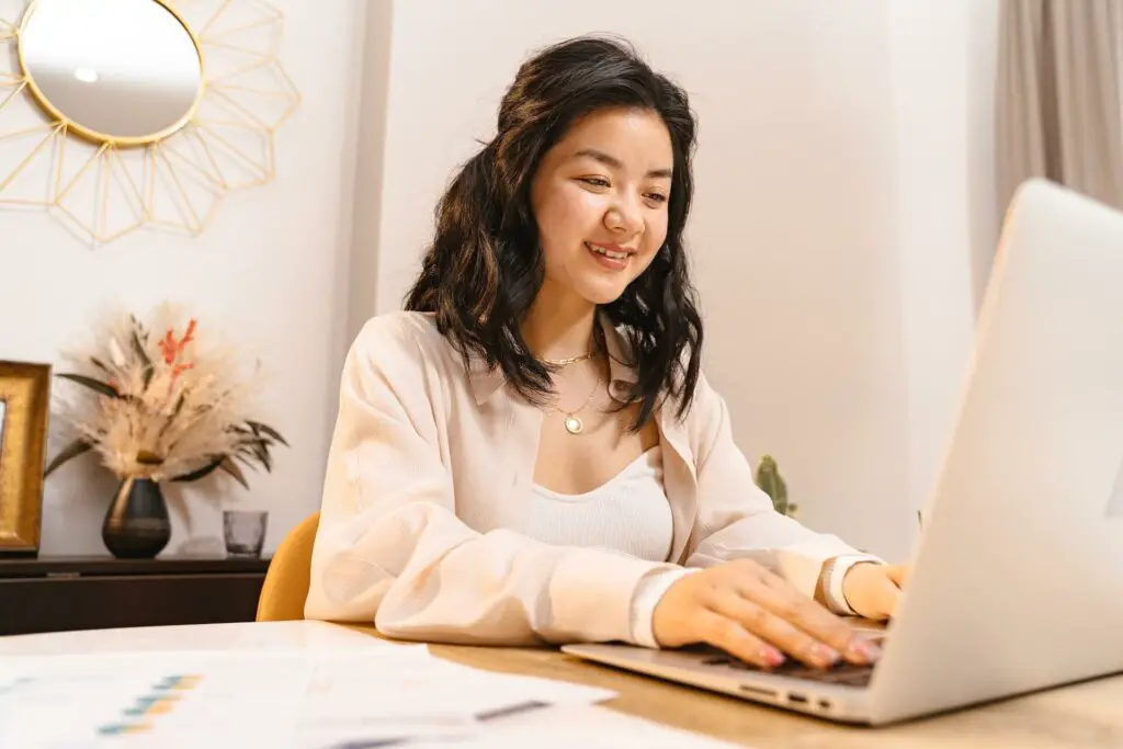  A woman using a laptop