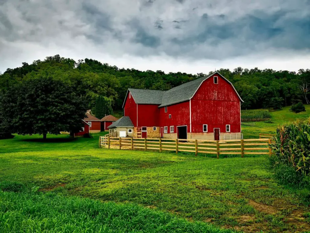 Red barn with the fence