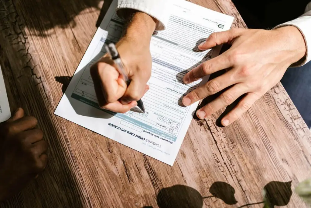 Person signing a contract  