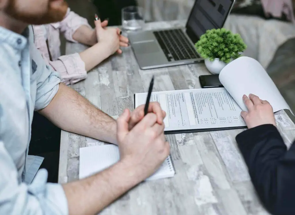 People sitting around a desk