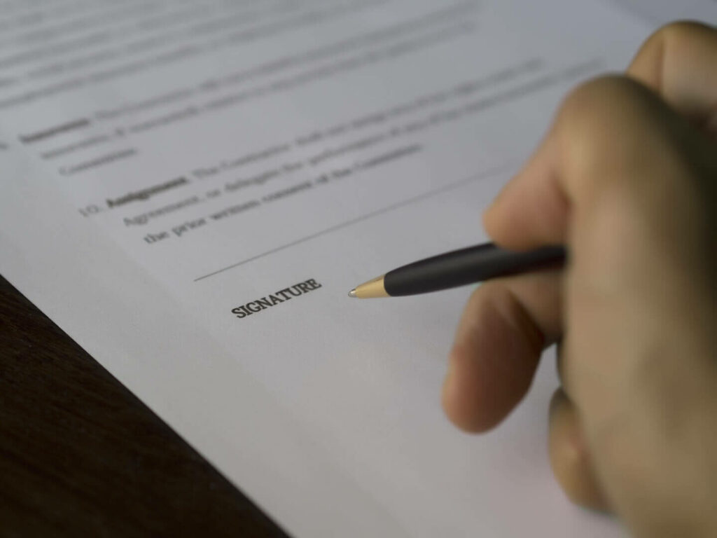 Person signing a document