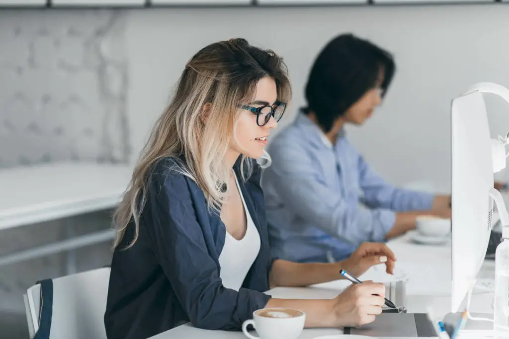 Woman looking at a computer