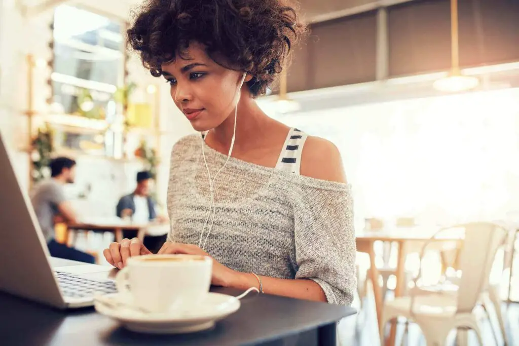 A woman paying off a mortgage online