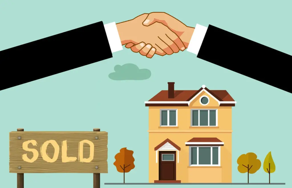 Two people shaking hands in front of a sold house