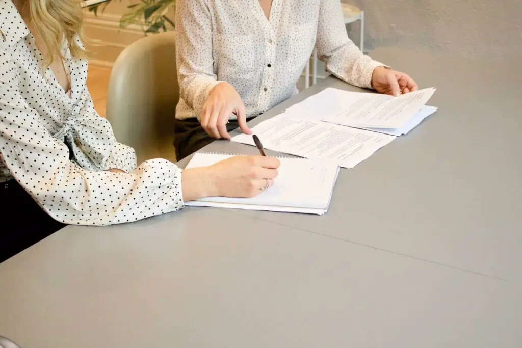 Two women going over documents